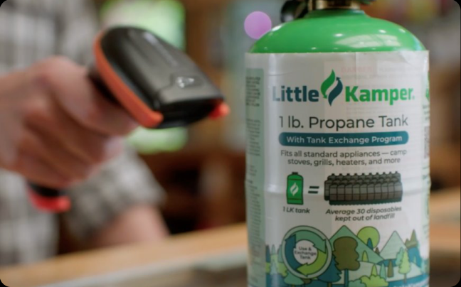 Little Kamper What Fuels You brand film still showing a propane tank at checkout